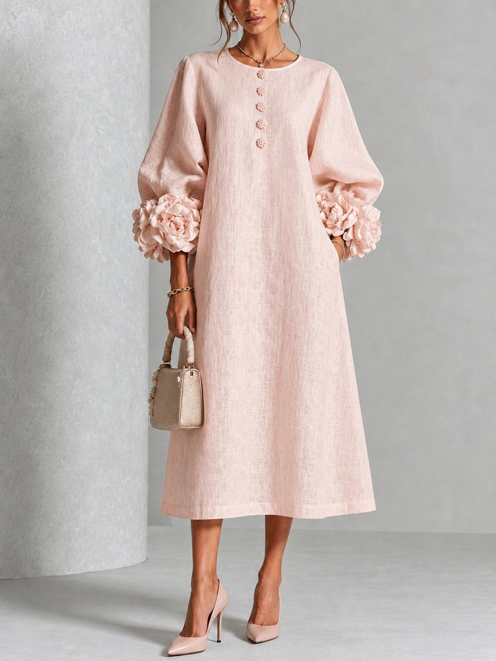 Robe midi rose à fleurs boutonnée avec de superbes poignets fleuris