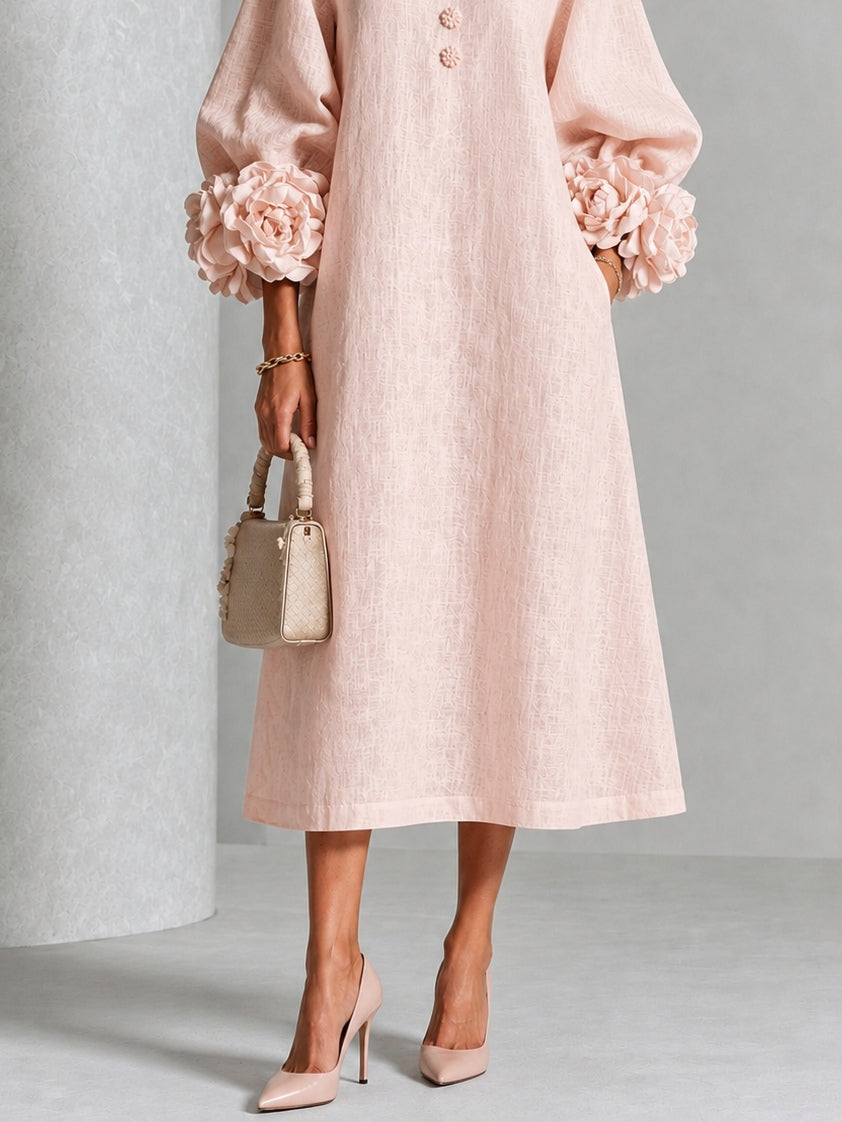 Robe midi rose à fleurs boutonnée avec de superbes poignets fleuris