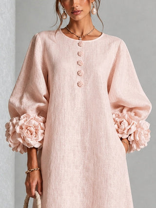 Robe midi rose à fleurs boutonnée avec de superbes poignets fleuris
