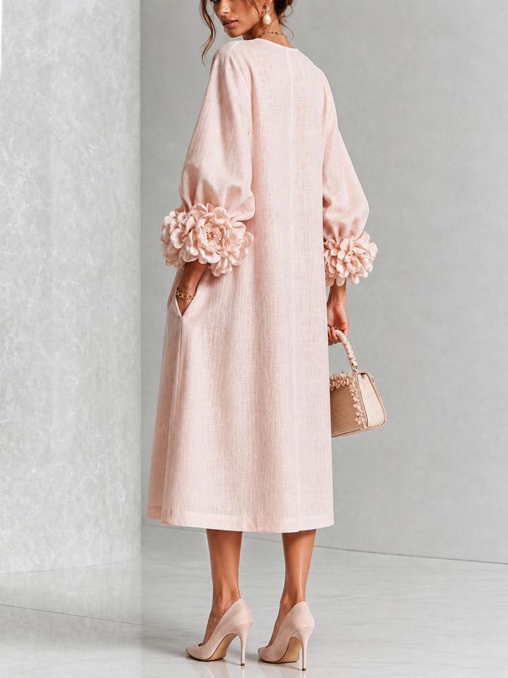 Robe midi rose à fleurs boutonnée avec de superbes poignets fleuris