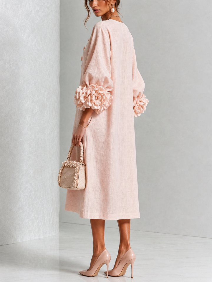 Robe midi rose à fleurs boutonnée avec de superbes poignets fleuris