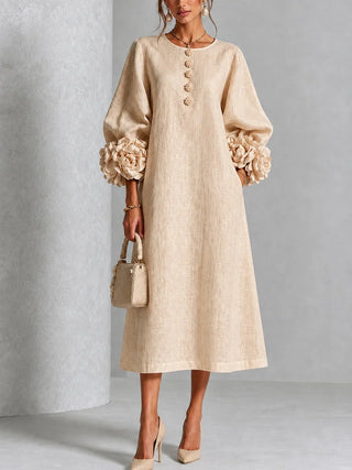 Robe midi rose à fleurs boutonnée avec de superbes poignets fleuris
