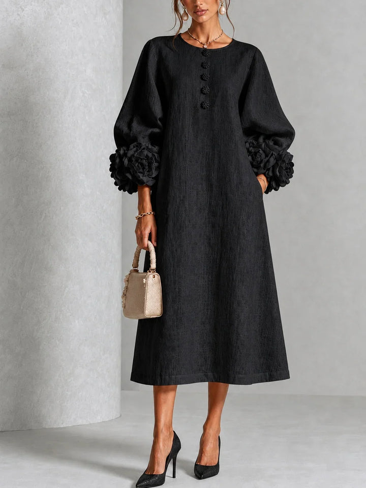 Robe midi rose à fleurs boutonnée avec de superbes poignets fleuris