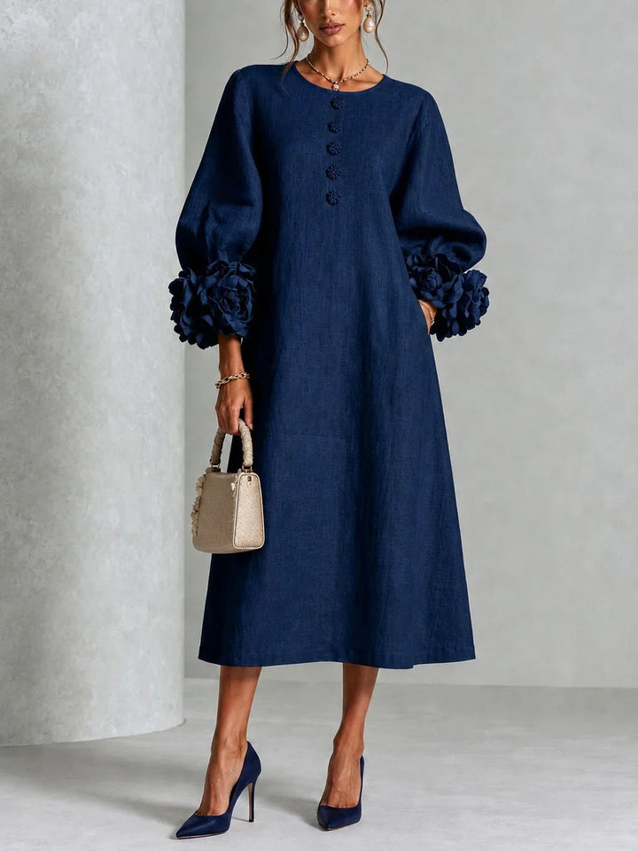 Robe midi rose à fleurs boutonnée avec de superbes poignets fleuris