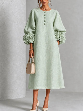 Robe midi rose à fleurs boutonnée avec de superbes poignets fleuris