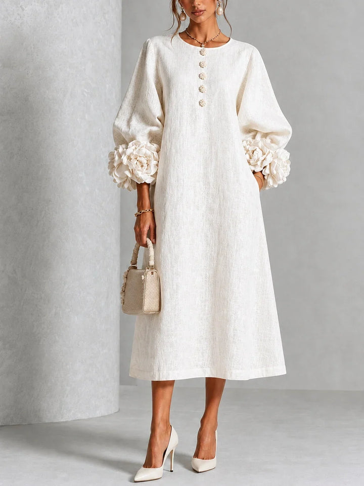 Robe midi rose à fleurs boutonnée avec de superbes poignets fleuris